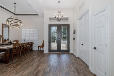 CHAMPIONS CLUB SHOWSTOPPER! This Luxury Built GOLF COURSE Home on Fox Hollow Golf Club in Florida - for sale on GolfHomes.com, golf home, golf lot