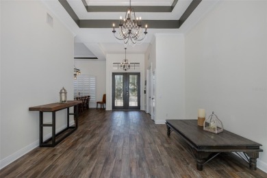CHAMPIONS CLUB SHOWSTOPPER! This Luxury Built GOLF COURSE Home on Fox Hollow Golf Club in Florida - for sale on GolfHomes.com, golf home, golf lot