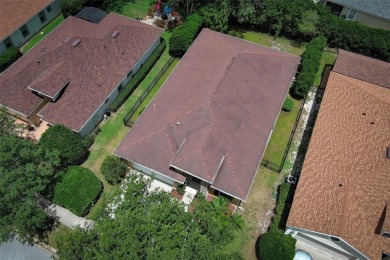 Nestled within tree lined streets and mature landscaping in the on Victoria Hills Golf Club in Florida - for sale on GolfHomes.com, golf home, golf lot