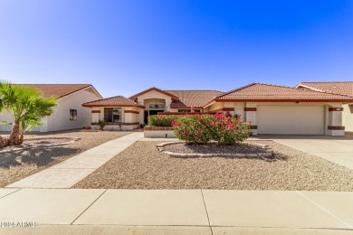 Step into this spacious, sun-soaked 3-bedroom, 2-bath San Simeon on Stardust Golf Course in Arizona - for sale on GolfHomes.com, golf home, golf lot