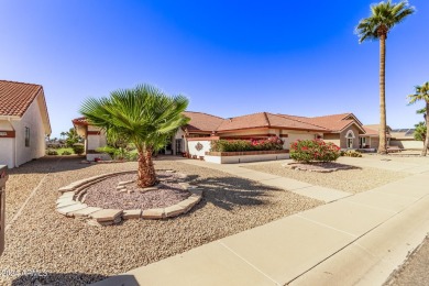 Step into this spacious, sun-soaked 3-bedroom, 2-bath San Simeon on Stardust Golf Course in Arizona - for sale on GolfHomes.com, golf home, golf lot