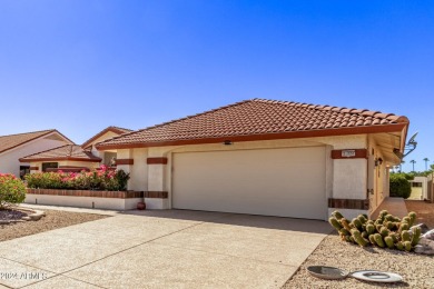 Step into this spacious, sun-soaked 3-bedroom, 2-bath San Simeon on Stardust Golf Course in Arizona - for sale on GolfHomes.com, golf home, golf lot