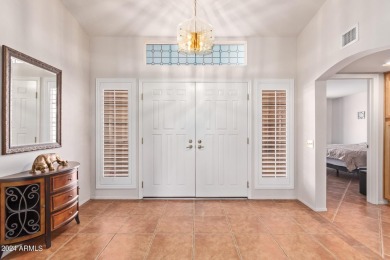 Step into this spacious, sun-soaked 3-bedroom, 2-bath San Simeon on Stardust Golf Course in Arizona - for sale on GolfHomes.com, golf home, golf lot