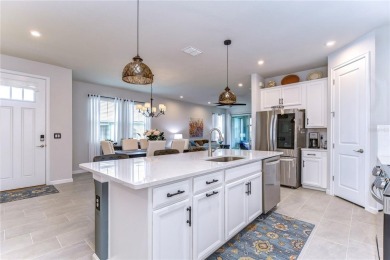 Experience refined living in this luxury villa nestled within on The Golf Club of Cypress Creek in Florida - for sale on GolfHomes.com, golf home, golf lot