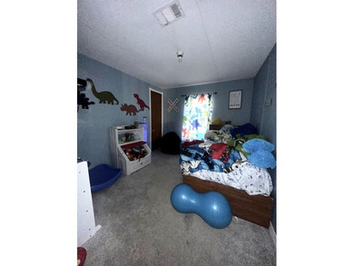 Comfort and ease awaits on 4.92 cleared fenced acres with gated on Chiefland Golf and Country Club in Florida - for sale on GolfHomes.com, golf home, golf lot