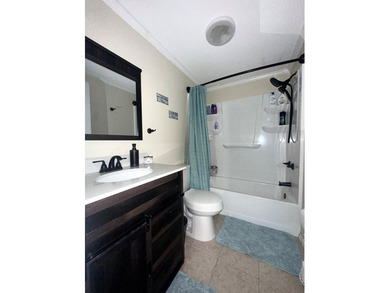 Comfort and ease awaits on 4.92 cleared fenced acres with gated on Chiefland Golf and Country Club in Florida - for sale on GolfHomes.com, golf home, golf lot