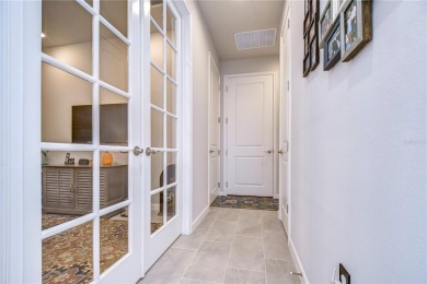 Experience refined living in this luxury villa nestled within on The Golf Club of Cypress Creek in Florida - for sale on GolfHomes.com, golf home, golf lot
