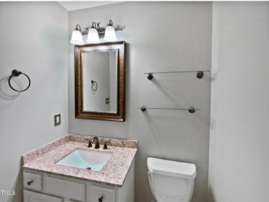 Welcome to a home that exudes elegance and sophistication. The on Hedingham Golf and Athletic Club in North Carolina - for sale on GolfHomes.com, golf home, golf lot