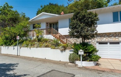 Welcome to this charming 3-bedroom, 2-bathroom hillside retreat on Chevy Chase Country Club in California - for sale on GolfHomes.com, golf home, golf lot