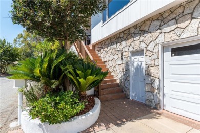 Welcome to this charming 3-bedroom, 2-bathroom hillside retreat on Chevy Chase Country Club in California - for sale on GolfHomes.com, golf home, golf lot