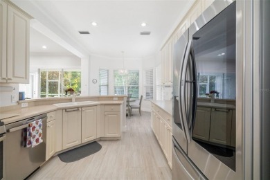 TASTEFULLY REMODELED AND READY FOR LUCKY NEW OWNERS! WELCOME TO on University Park Country Club in Florida - for sale on GolfHomes.com, golf home, golf lot