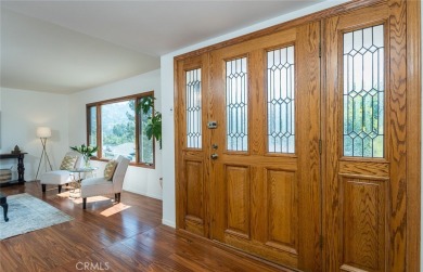 Welcome to this charming 3-bedroom, 2-bathroom hillside retreat on Chevy Chase Country Club in California - for sale on GolfHomes.com, golf home, golf lot