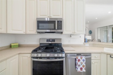 TASTEFULLY REMODELED AND READY FOR LUCKY NEW OWNERS! WELCOME TO on University Park Country Club in Florida - for sale on GolfHomes.com, golf home, golf lot