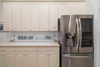 TASTEFULLY REMODELED AND READY FOR LUCKY NEW OWNERS! WELCOME TO on University Park Country Club in Florida - for sale on GolfHomes.com, golf home, golf lot