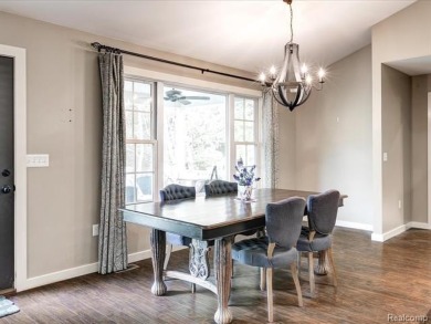 ESCAPE TO THIS SPACIOUS RANCH STYLE HOME IN LEXINGTON! NESTLED on Lakeview Hills Country Club and Resort  in Michigan - for sale on GolfHomes.com, golf home, golf lot
