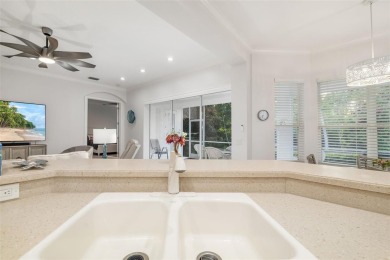 TASTEFULLY REMODELED AND READY FOR LUCKY NEW OWNERS! WELCOME TO on University Park Country Club in Florida - for sale on GolfHomes.com, golf home, golf lot