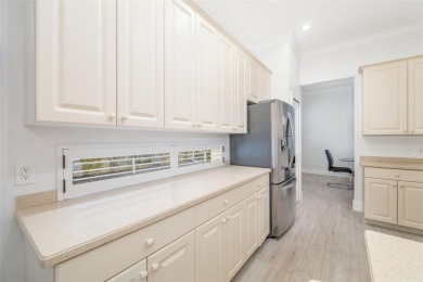 TASTEFULLY REMODELED AND READY FOR LUCKY NEW OWNERS! WELCOME TO on University Park Country Club in Florida - for sale on GolfHomes.com, golf home, golf lot