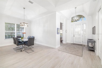 TASTEFULLY REMODELED AND READY FOR LUCKY NEW OWNERS! WELCOME TO on University Park Country Club in Florida - for sale on GolfHomes.com, golf home, golf lot