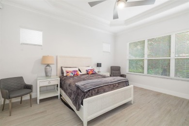 TASTEFULLY REMODELED AND READY FOR LUCKY NEW OWNERS! WELCOME TO on University Park Country Club in Florida - for sale on GolfHomes.com, golf home, golf lot
