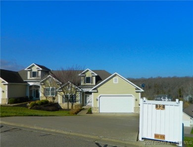 This Country Club Cove Villa is ready for new owners.  Sits on Seasons Ridge At Four Seasons in Missouri - for sale on GolfHomes.com, golf home, golf lot