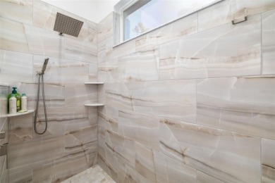 TASTEFULLY REMODELED AND READY FOR LUCKY NEW OWNERS! WELCOME TO on University Park Country Club in Florida - for sale on GolfHomes.com, golf home, golf lot