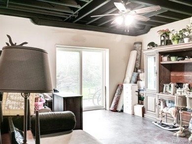 ESCAPE TO THIS SPACIOUS RANCH STYLE HOME IN LEXINGTON! NESTLED on Lakeview Hills Country Club and Resort  in Michigan - for sale on GolfHomes.com, golf home, golf lot