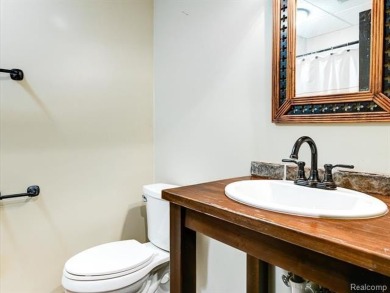 ESCAPE TO THIS SPACIOUS RANCH STYLE HOME IN LEXINGTON! NESTLED on Lakeview Hills Country Club and Resort  in Michigan - for sale on GolfHomes.com, golf home, golf lot