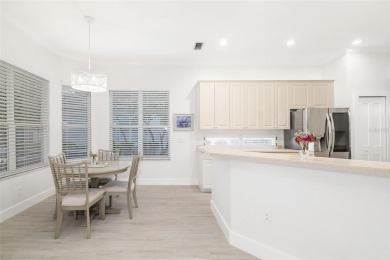 TASTEFULLY REMODELED AND READY FOR LUCKY NEW OWNERS! WELCOME TO on University Park Country Club in Florida - for sale on GolfHomes.com, golf home, golf lot