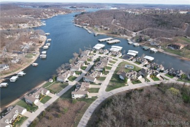 This Country Club Cove Villa is ready for new owners.  Sits on Seasons Ridge At Four Seasons in Missouri - for sale on GolfHomes.com, golf home, golf lot