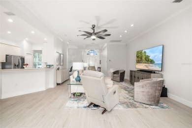 TASTEFULLY REMODELED AND READY FOR LUCKY NEW OWNERS! WELCOME TO on University Park Country Club in Florida - for sale on GolfHomes.com, golf home, golf lot