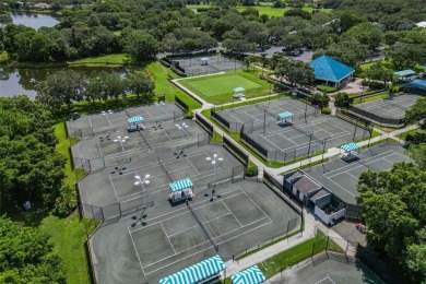 TASTEFULLY REMODELED AND READY FOR LUCKY NEW OWNERS! WELCOME TO on University Park Country Club in Florida - for sale on GolfHomes.com, golf home, golf lot