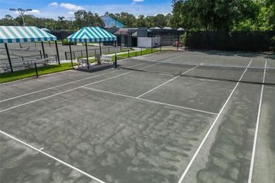 TASTEFULLY REMODELED AND READY FOR LUCKY NEW OWNERS! WELCOME TO on University Park Country Club in Florida - for sale on GolfHomes.com, golf home, golf lot