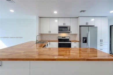 Welcome to this modern and beautifully renovated three-bedroom on Costa Greens Golf Club in Florida - for sale on GolfHomes.com, golf home, golf lot