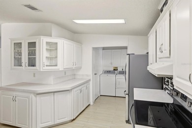 MAJOR PRICE DROP on this one owner unit. First time on the on Imperial Lakewoods Golf Club in Florida - for sale on GolfHomes.com, golf home, golf lot