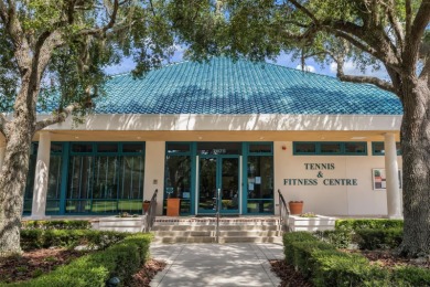 TASTEFULLY REMODELED AND READY FOR LUCKY NEW OWNERS! WELCOME TO on University Park Country Club in Florida - for sale on GolfHomes.com, golf home, golf lot