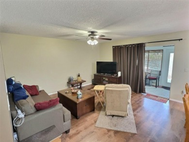 Cozy, Renovated and TURN KEY LOWER unit with amazing LAKE AND on Country Club At Silver Springs Shores in Florida - for sale on GolfHomes.com, golf home, golf lot