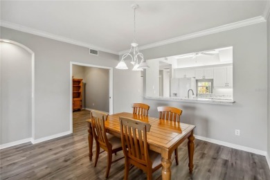 TEN MINUTES TO THE BEACH!   Enjoy stunning golf course and water on Capri Isle Golf Club in Florida - for sale on GolfHomes.com, golf home, golf lot