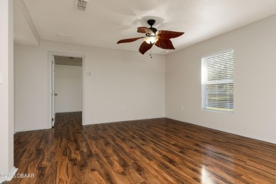 Discover the beauty of waterfront living in this stunning on LPGA International Golf Course in Florida - for sale on GolfHomes.com, golf home, golf lot