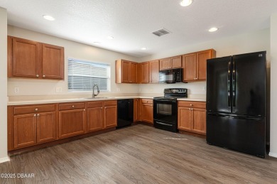 Discover the beauty of waterfront living in this stunning on LPGA International Golf Course in Florida - for sale on GolfHomes.com, golf home, golf lot