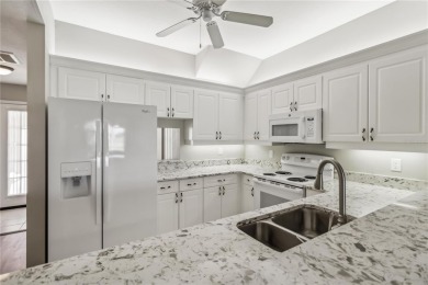 TEN MINUTES TO THE BEACH!   Enjoy stunning golf course and water on Capri Isle Golf Club in Florida - for sale on GolfHomes.com, golf home, golf lot