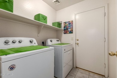 Move-in ready home in the gated Stonegate community at Johnson on The Golf Club At Johnson Ranch in Arizona - for sale on GolfHomes.com, golf home, golf lot