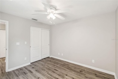 TEN MINUTES TO THE BEACH!   Enjoy stunning golf course and water on Capri Isle Golf Club in Florida - for sale on GolfHomes.com, golf home, golf lot