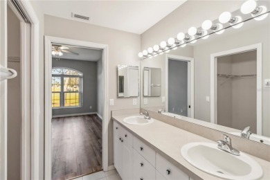 TEN MINUTES TO THE BEACH!   Enjoy stunning golf course and water on Capri Isle Golf Club in Florida - for sale on GolfHomes.com, golf home, golf lot