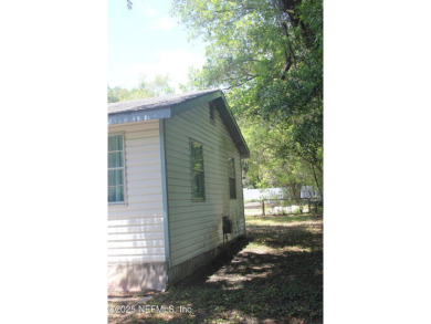 Charming Cottage Near Golf, Parks, and Beaches! Discover the on Palatka Golf Club in Florida - for sale on GolfHomes.com, golf home, golf lot