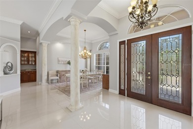 This custom Mediterranean style home in the Hyde Park village of on University Park Country Club in Florida - for sale on GolfHomes.com, golf home, golf lot