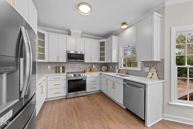 Beautifully renovated and truly move-in ready, this brick-front on Devils Ridge Golf Club in North Carolina - for sale on GolfHomes.com, golf home, golf lot