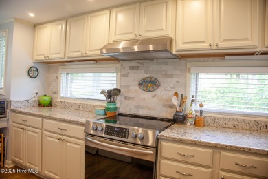 Welcome to this gorgeous, modernized end-unit = 109 Egret Ct on Olde Point Golf and Country Club in North Carolina - for sale on GolfHomes.com, golf home, golf lot