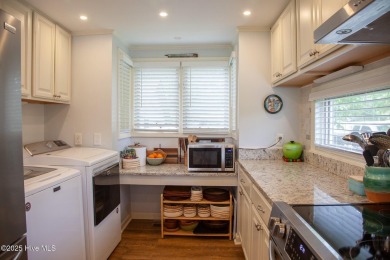 Welcome to this gorgeous, modernized end-unit = 109 Egret Ct on Olde Point Golf and Country Club in North Carolina - for sale on GolfHomes.com, golf home, golf lot