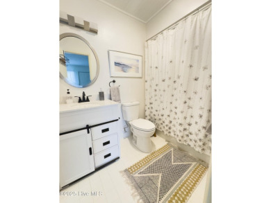 Welcome to this gorgeous, modernized end-unit = 109 Egret Ct on Olde Point Golf and Country Club in North Carolina - for sale on GolfHomes.com, golf home, golf lot