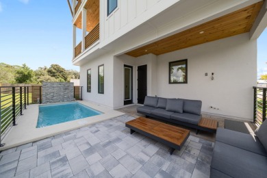 This NEW CONSTRUCTION HOME is furnished, available NOW and ready on Signal Hill Golf Course, Inc. in Florida - for sale on GolfHomes.com, golf home, golf lot